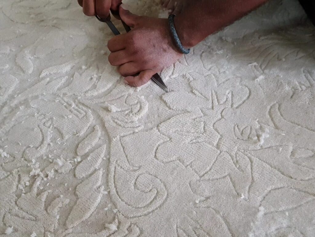 Hand Carving of a Handmade Rug